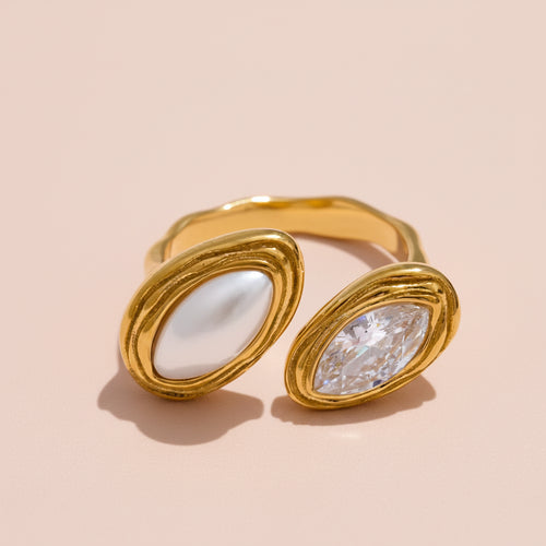 Gold ring with two distinct gemstones